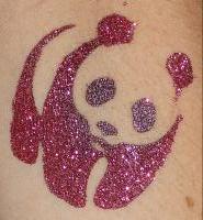 A panda bear with pink and purple sparkles on it's back.