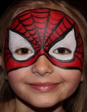 A child with a spider-man mask on.