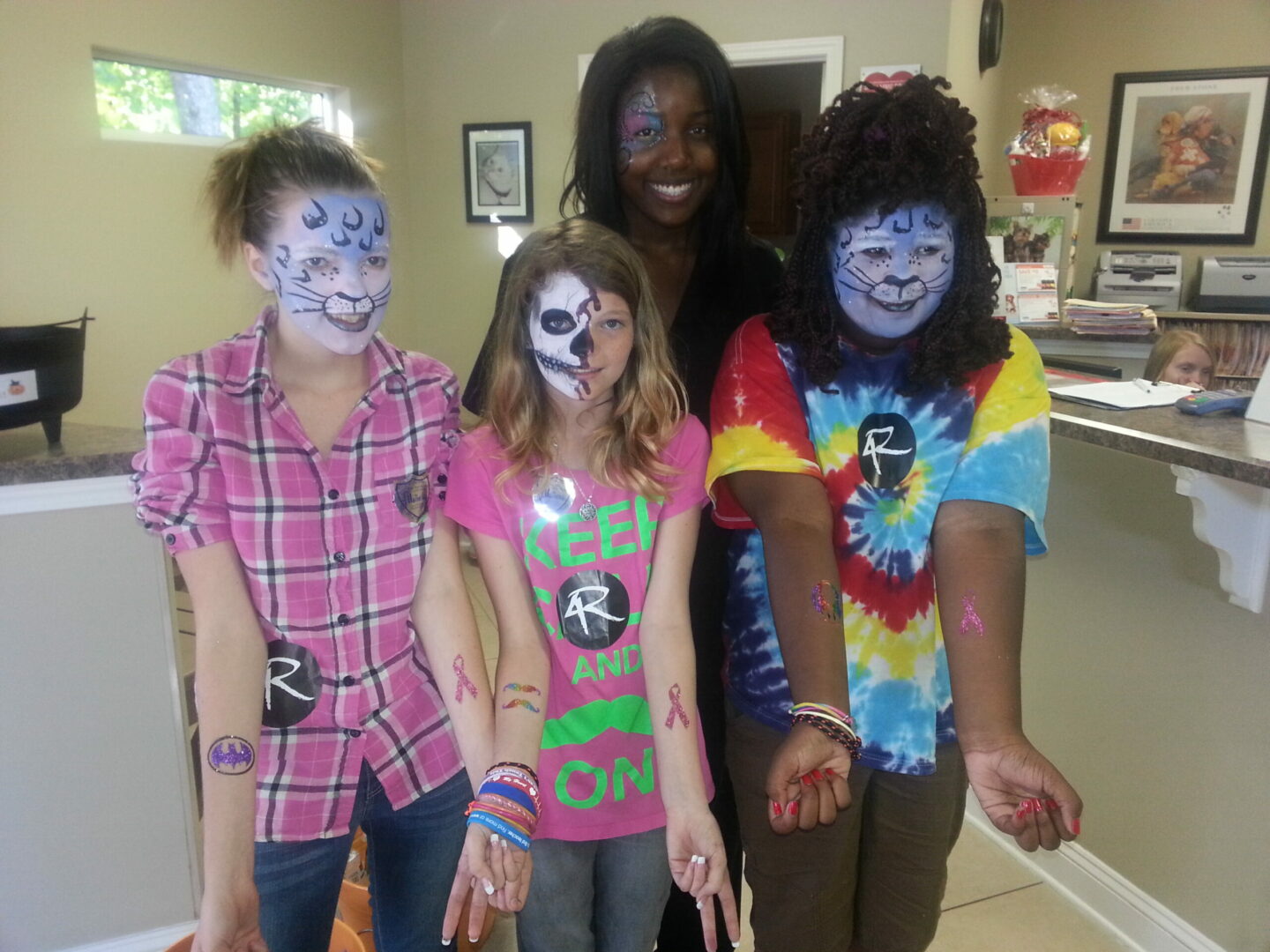 A group of people with face paint on their faces.