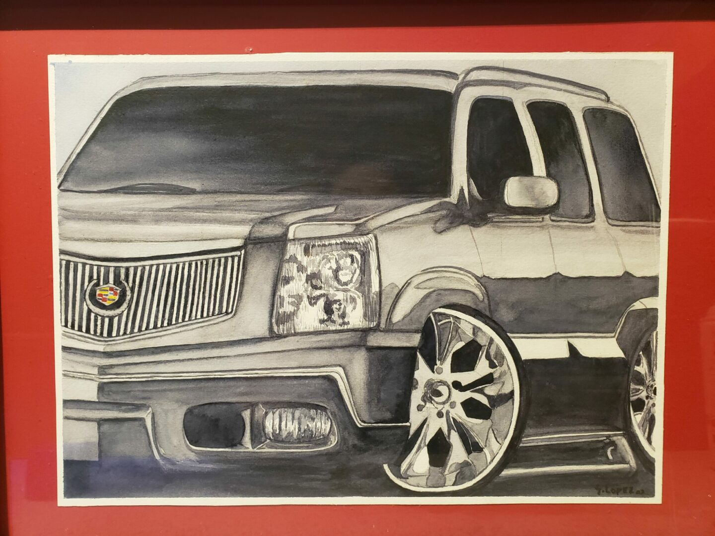 A drawing of a car on paper